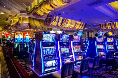 Mobile phone displaying lltoto2 live blackjack table with reload bonus notification